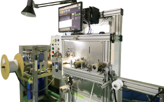 連続テープ貼り加工