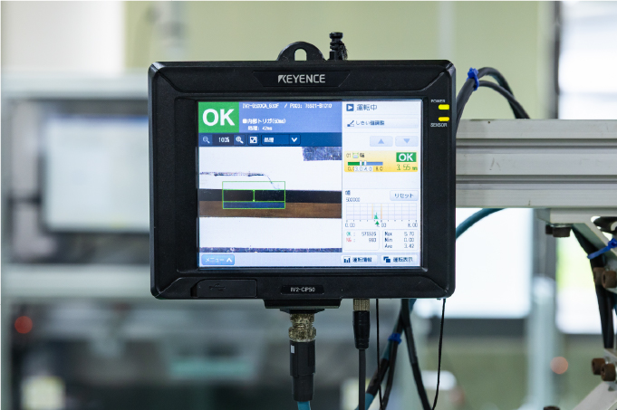 インラインでの加工自動化で目標コスト達成