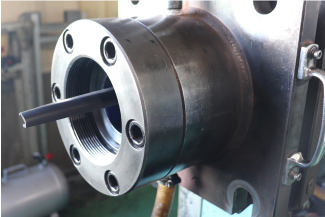 インラインでの加工自動化で目標コスト達成